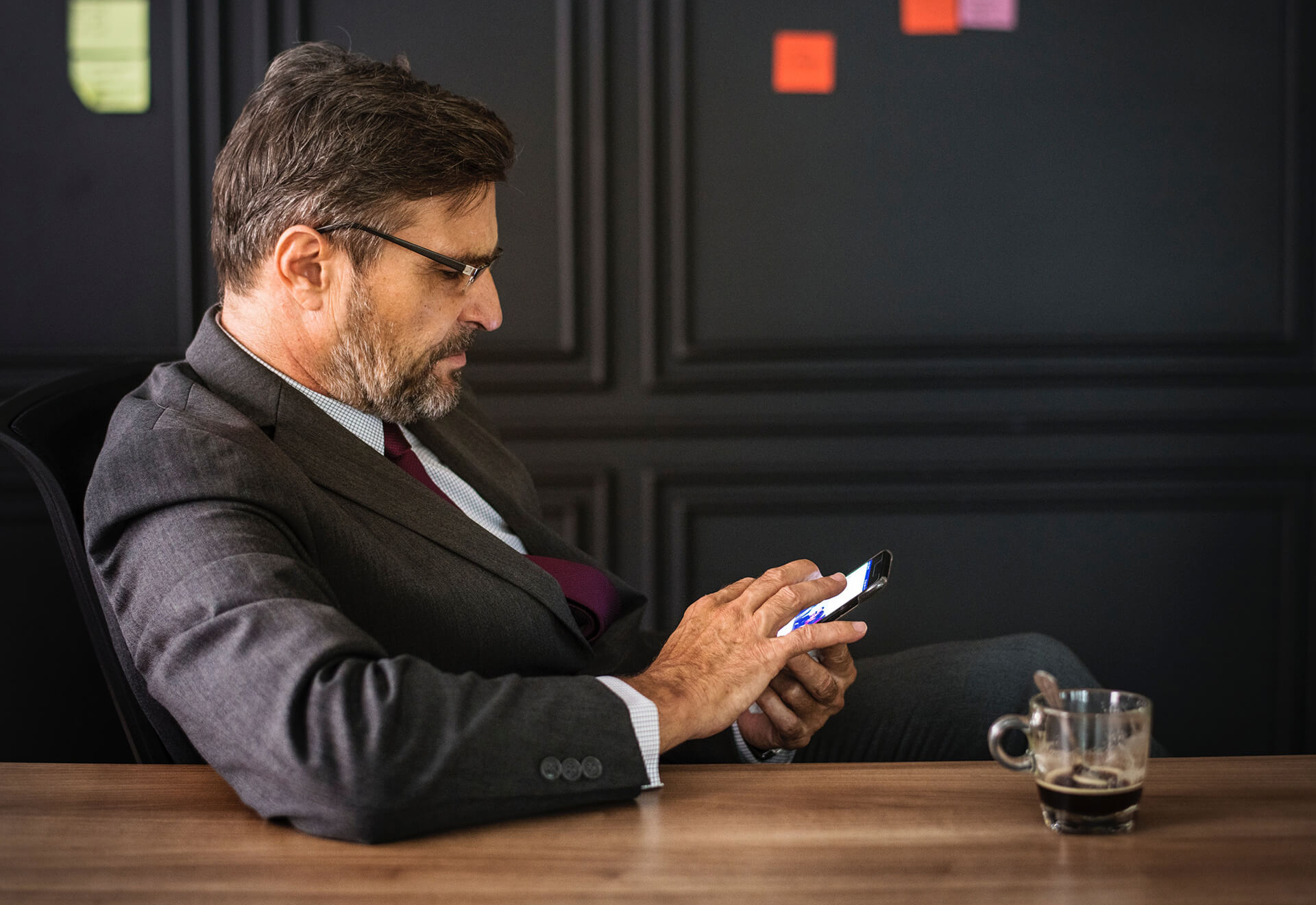 Man using smartphone to contact